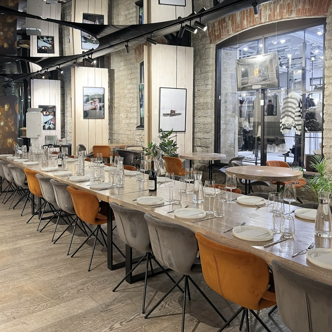 Gallery Café interior — long communal table set for breakfast